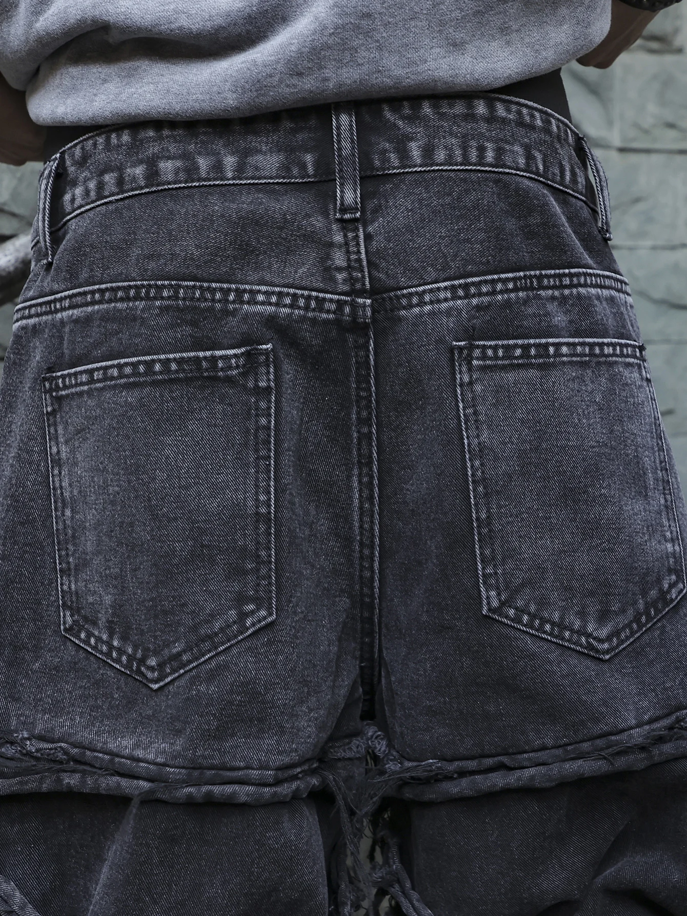 Men's black jeans. With a design of (ripped holes) and tassels. In a street trend style. - Image 6